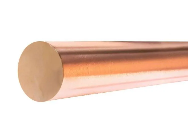 A round copper alloy bar, its cut end facing the camera.